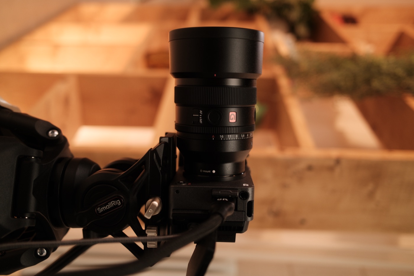 Close-up of a Sony FX3 camera and lens on set.